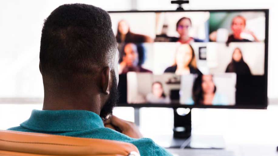 A man in a Zoom meeting